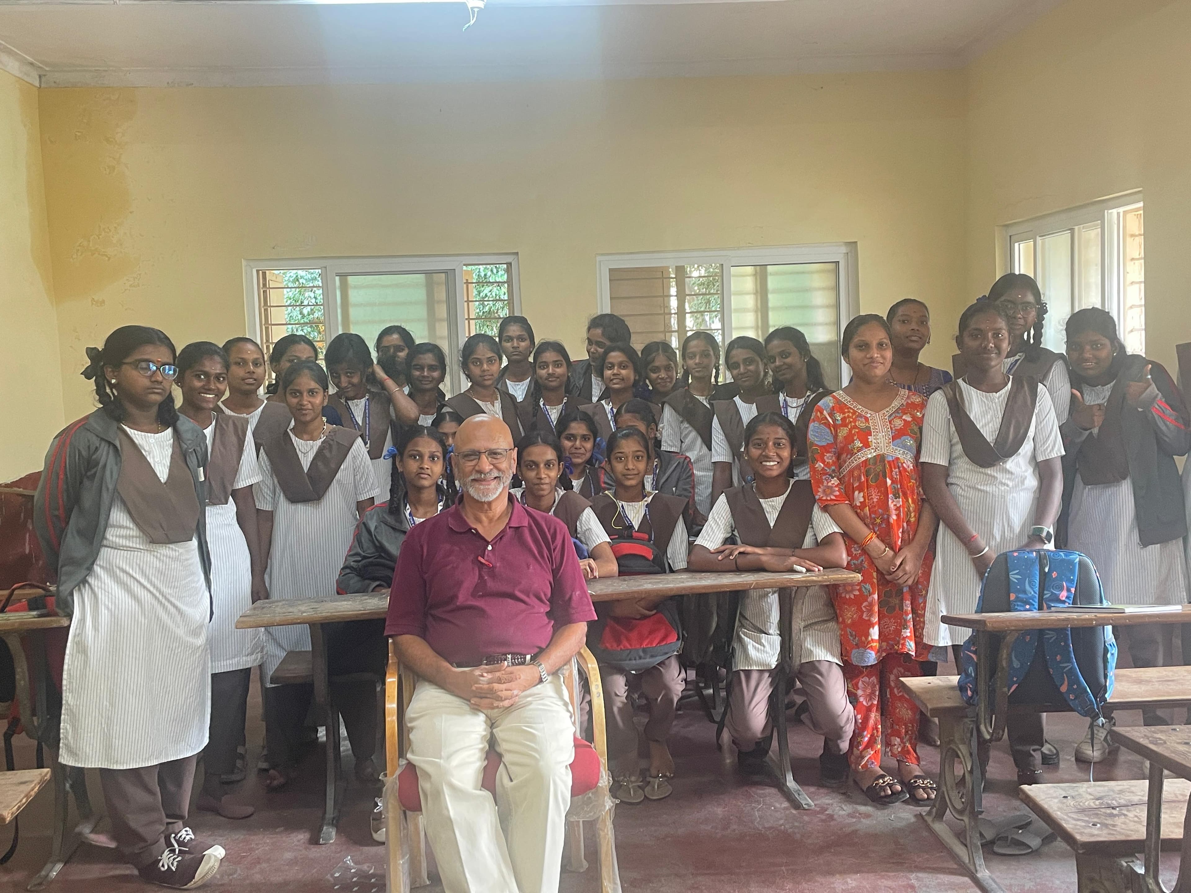 Hartej Singh with students at Jogupalya Girls High School